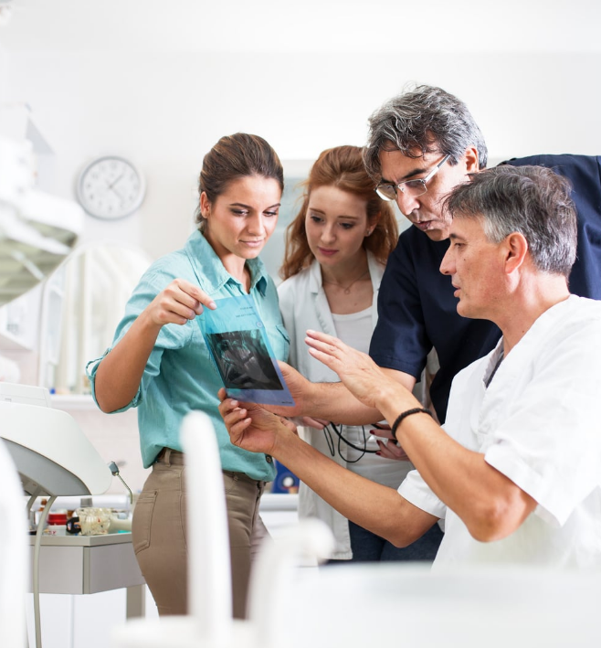 Dental team reviewing records